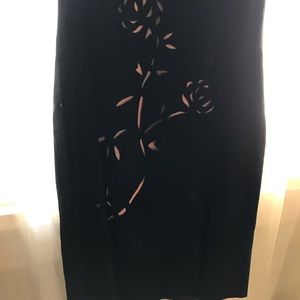 Black suede M. Kalan dress.